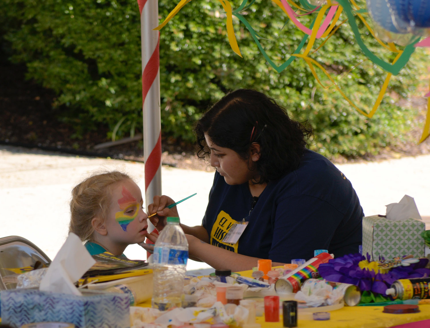 Children get their faces painted at Saturday's Hispanic Heritage Festival.
